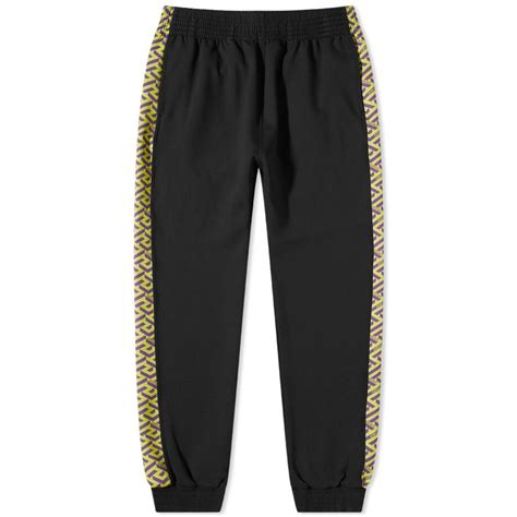 versace track pants price|Versace pink label pants.